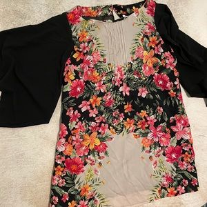 Under skies floral and black dress